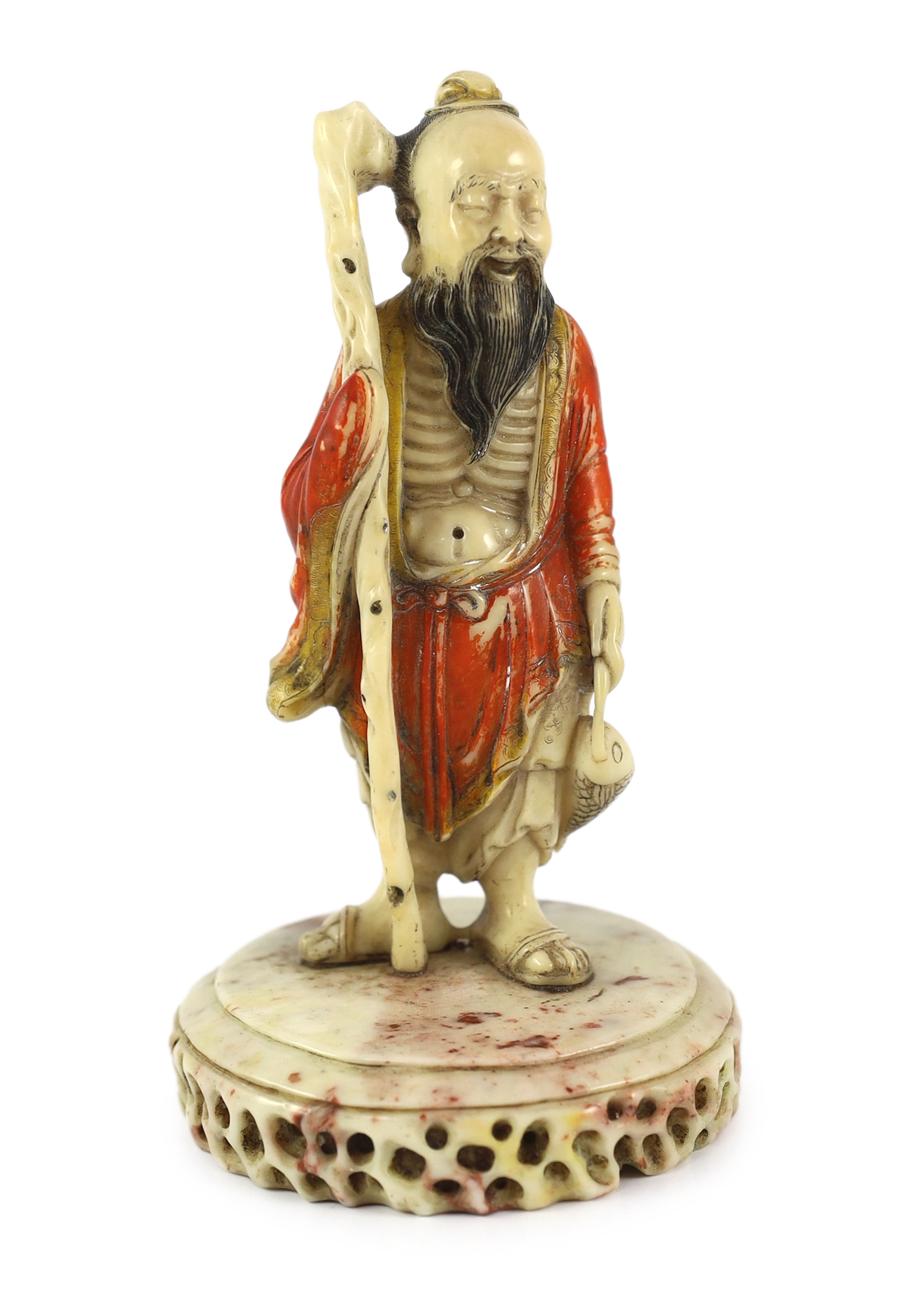 A Chinese soapstone figure of a fisherman, 17th/18th century